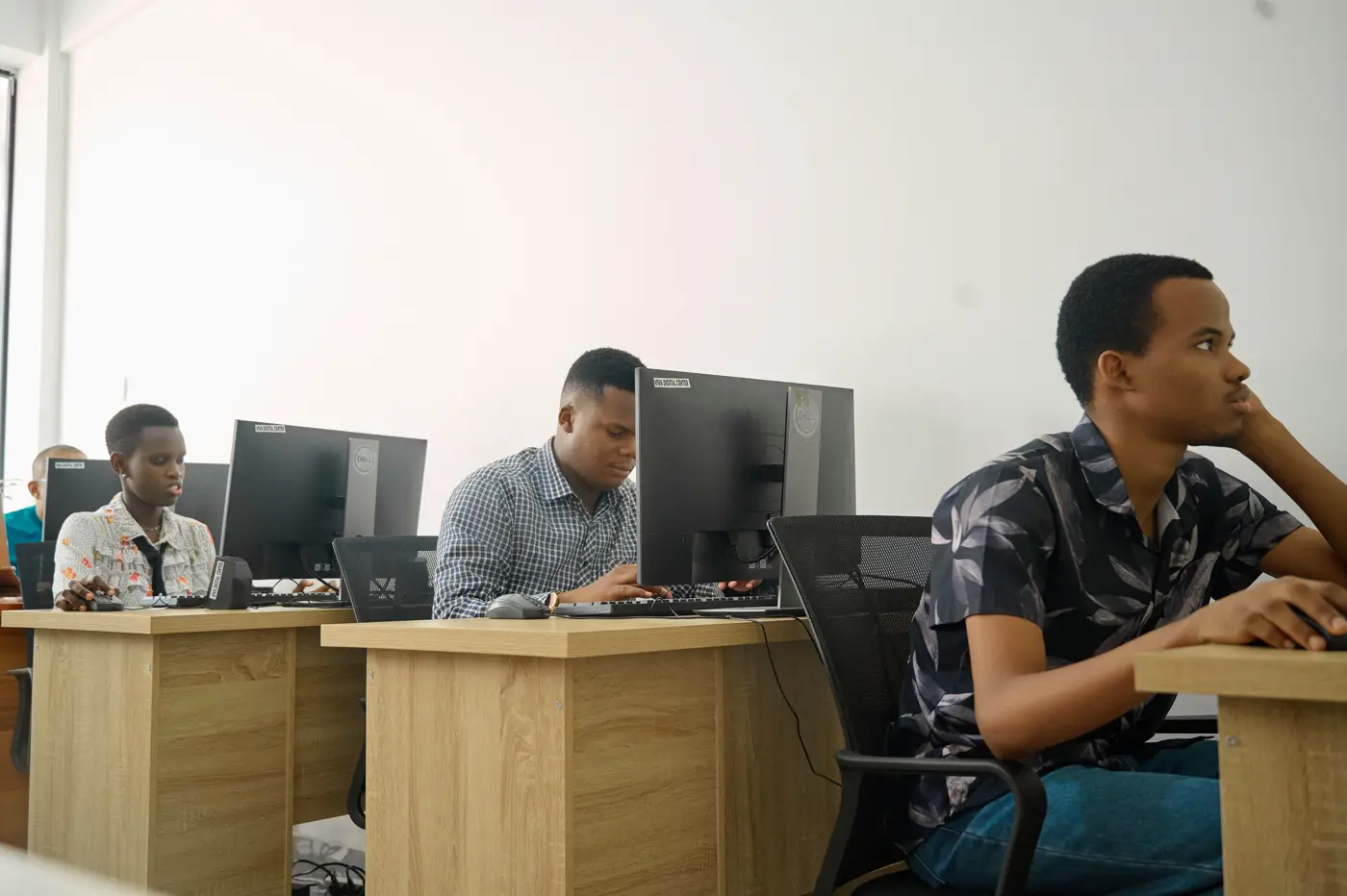 A trainee working at a computer during a class at VIVA